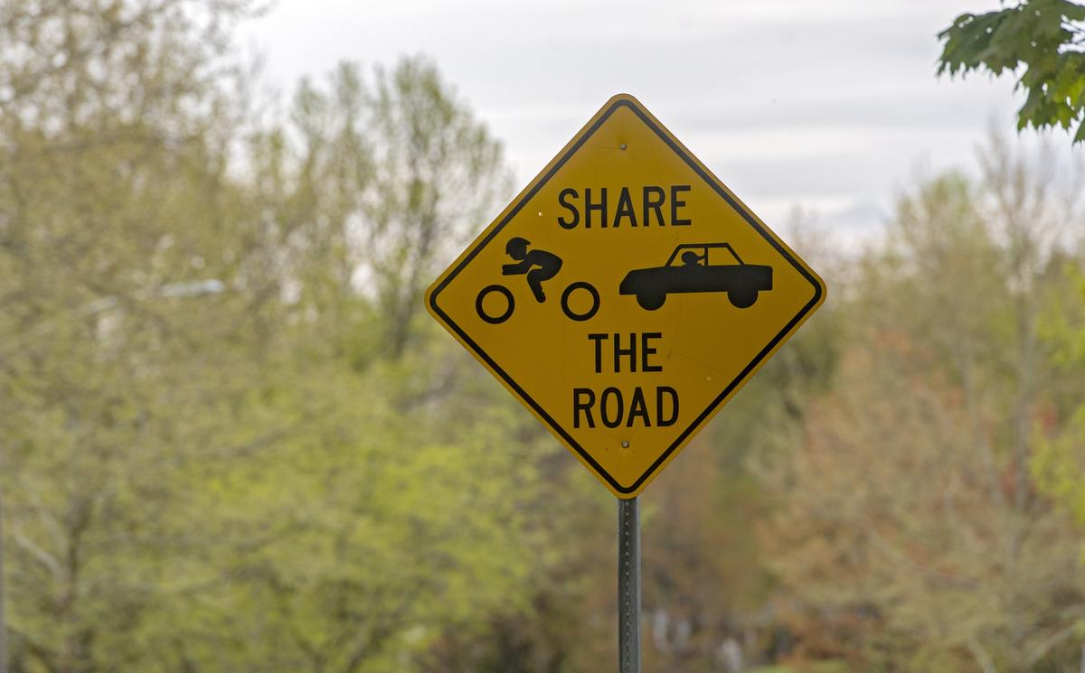 A sign on Easterly Parkway reminds bicycles and motorists to share the road.