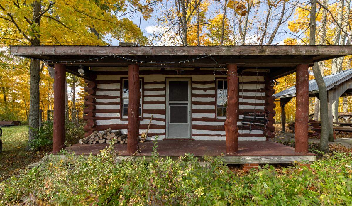 An exterior view of the cabin on the property at 124 Rock Hill Road in Harris Township. Photo courtesy of Kissinger, Bigatel & Brower Realtors.
