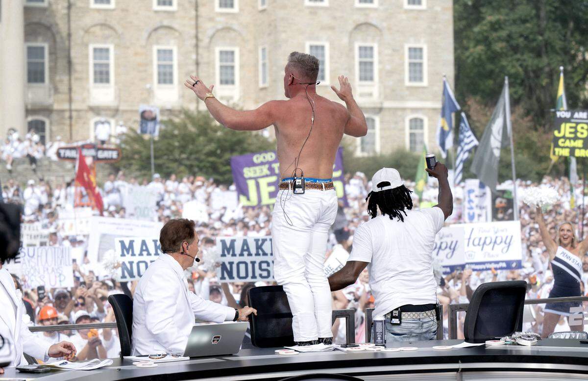 Pat McAfee rips off his shirt and does the “We Are” chant after picking Penn State to beat Oregon during ESPN’s College GameDay on Saturday, Sept. 27, 2025