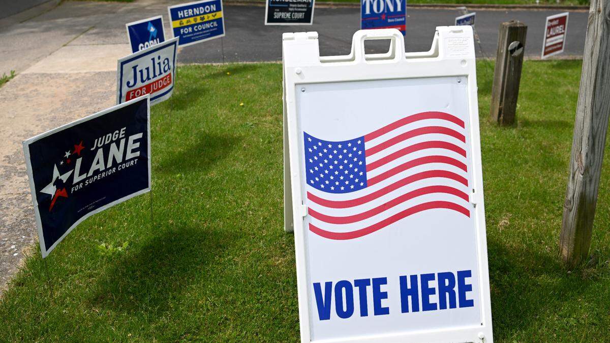 Campaign sings greet voters at the State College Friends Meeting precinct for the primary election on Tuesday, May 16, 2023.