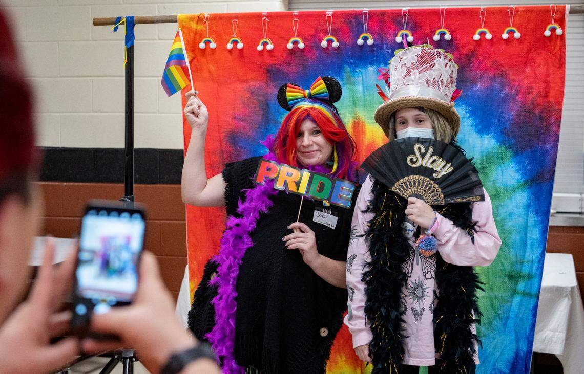 Beth Barger and Aven Bachman pose together for a photo at the National Coming Out Day event hosted but the Centre LGBTQA Support Network at Penns Valley Elementary on Tuesday, Oct. 11, 2022.