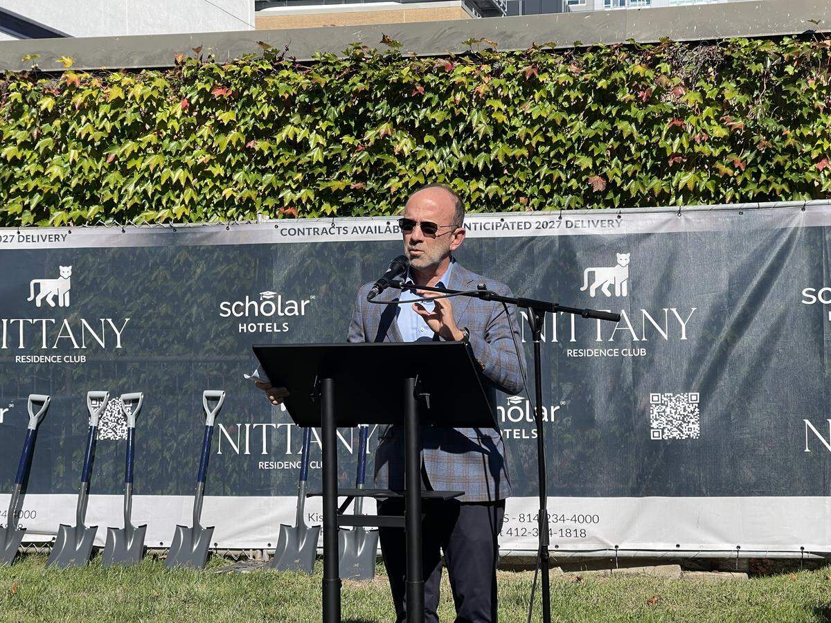 Gary Brandeis, CEO of Scholar Hotels, speaks at the groundbreaking ceremony for the Nittany Residence Club at 321 W. Beaver Ave., State College on Oct. 10.
