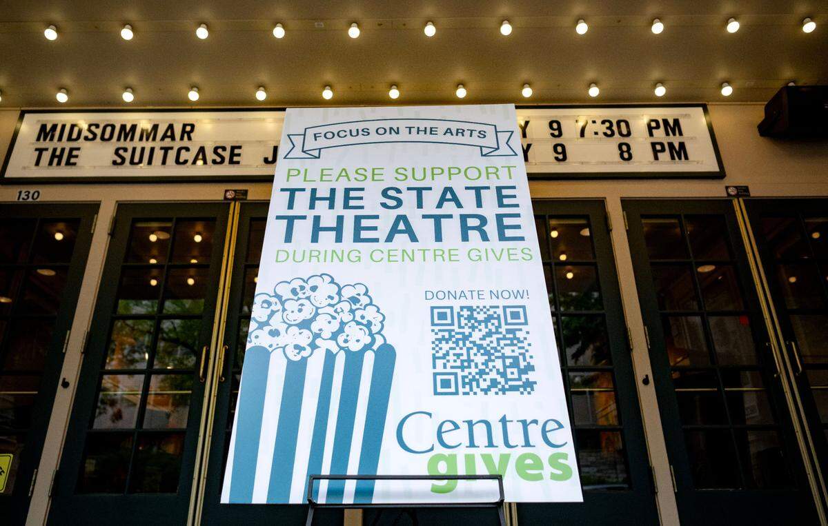 A sign hangs outside The State Theatre on Thursday during Centre Gives.