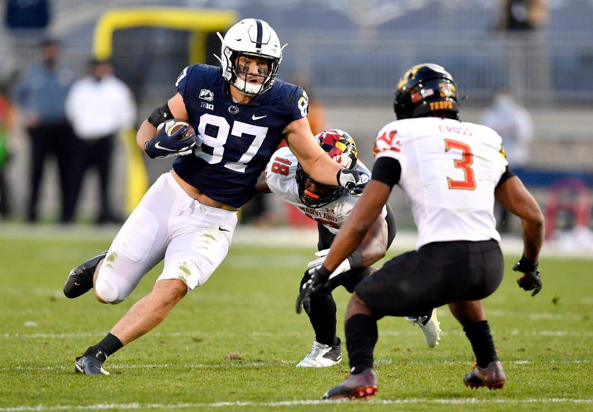 Penn State tight end Pat Freiermuth makes a catch and cuts down the field around Maryland defenders during the game on Saturday, Nov. 7, 2020 at Beaver Stadium.