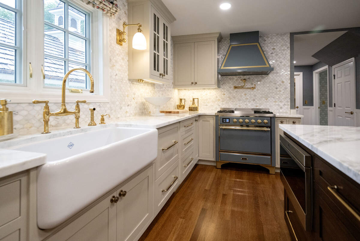 The kitchen of the home at 619 McKee St. in College Heights features Shaws Sinks and an ILIVE Majestic II range, seen Sept. 25, 2025.