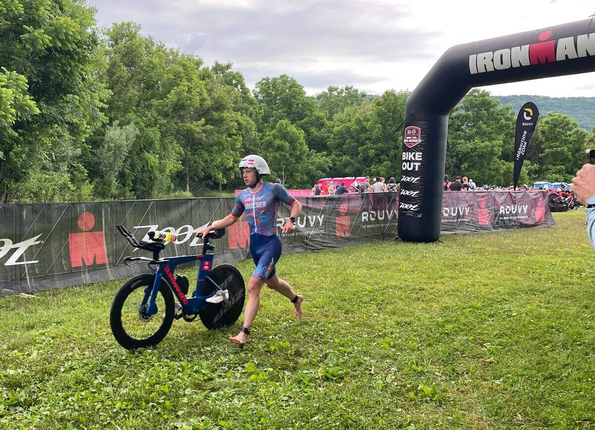 Pro athlete Andy Krueger prepares to hop on his bicycle Sunday, June 14, 2026, at the Ironman 70.3 Pennsylvania Happy Valley North American Championship in Centre and Clinton counties.