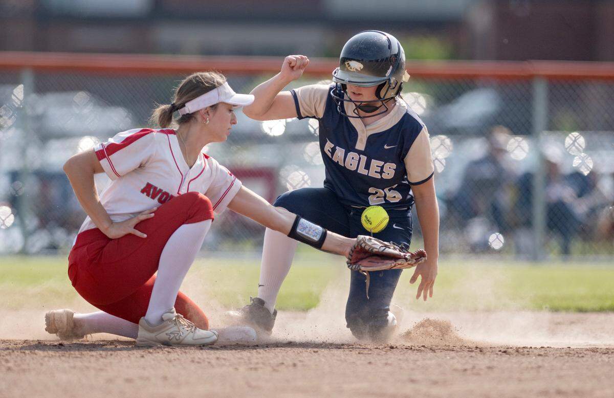 Bald Eagle Area’s Casey Angelotti safely steals second base as Avonworth’s Sydney Savatt reaches for the ball during the game on Monday, June 2, 2025.