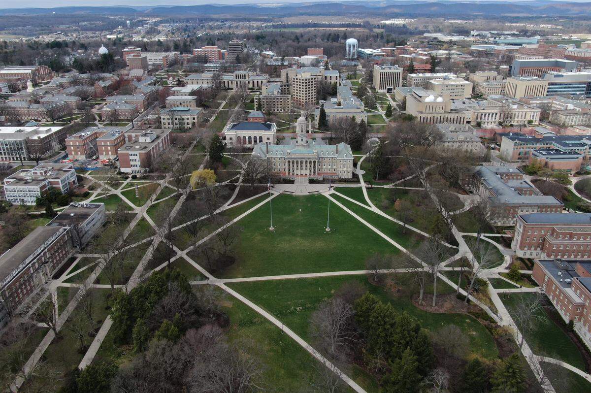 The walkways by Old Main on the Penn State campus are bare on Tuesday, March 24, 2020. Penn State suspended in-person classes for the remainder of the spring 2020 semester due to the coronavirus.