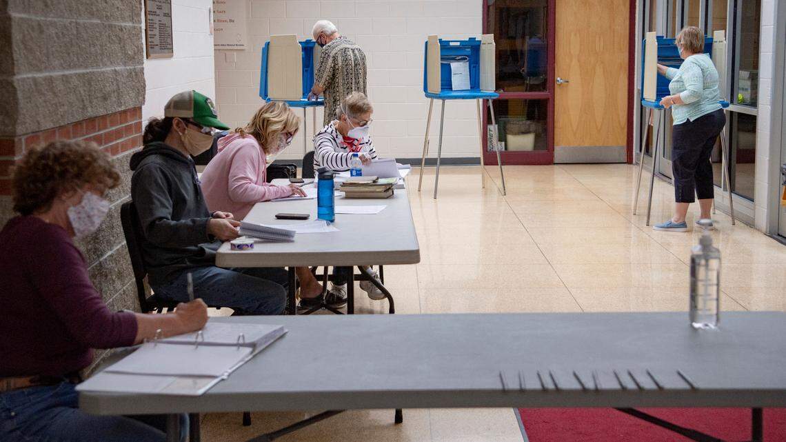 Planning to vote in person Nov. 3? Here’s what to know about poll watchers, poll workers