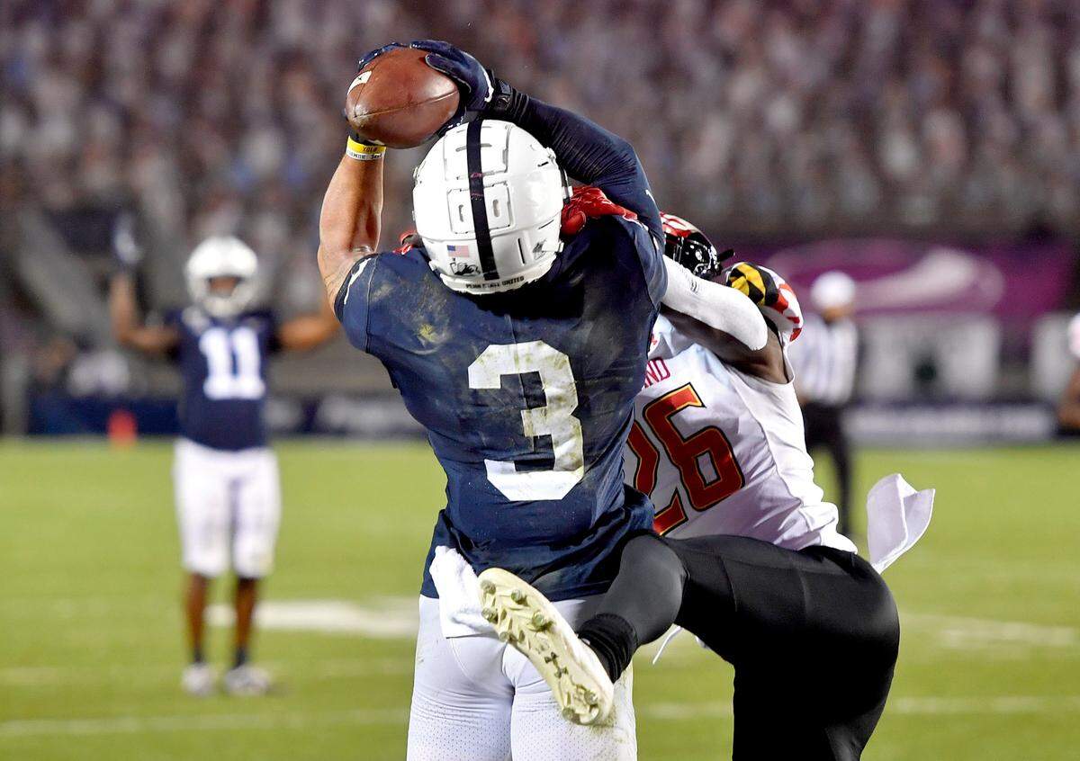Penn StateÕs Parker Washington makes as catch for a touchdown during the game against Maryland on Saturday, Nov. 7, 2020 at Beaver Stadium.
