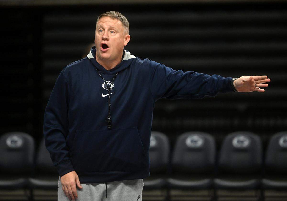Penn State men’s basketball coach Mike Rhoades explains a technique during practice on Wednesday, Oct. 23, 2024.