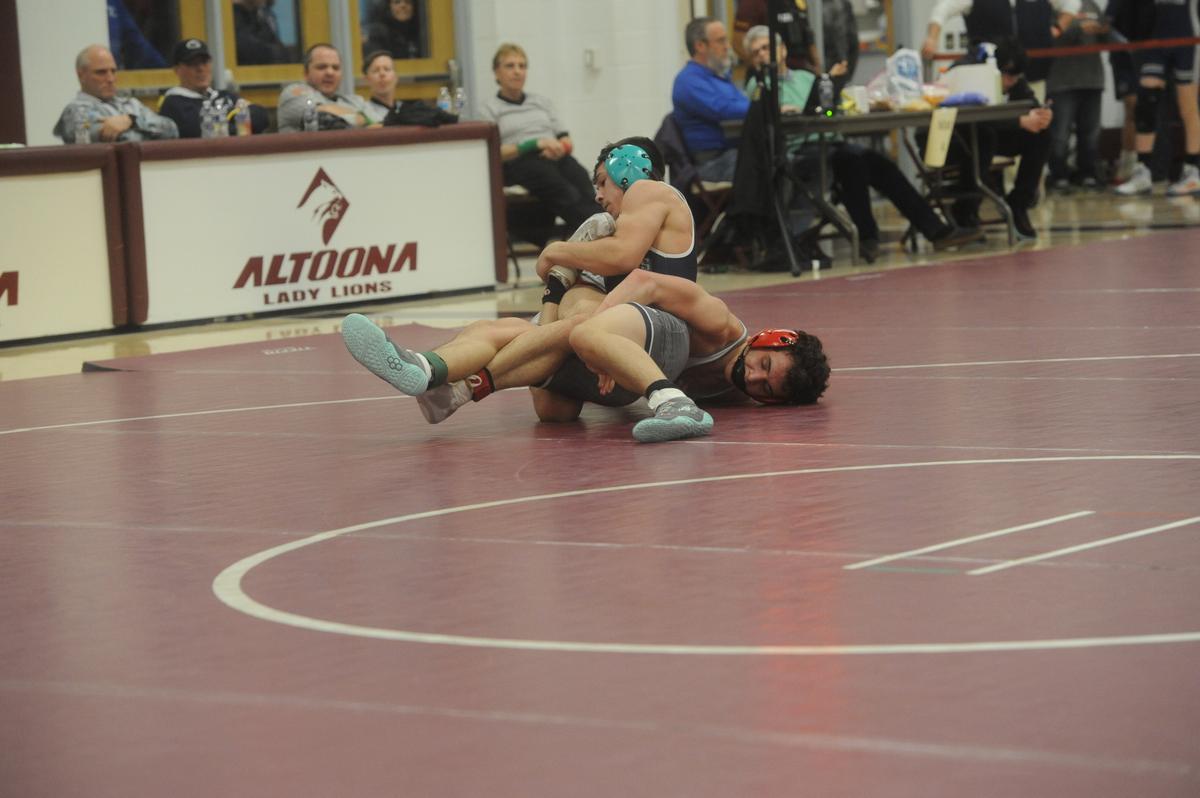 Philipsburg-Osceola’s Marcus Gable looks for a reversal on Bellefonte’s Max Murray in their 152-pound quarterfinals match of the District 6 Class 2A Championships on Friday, Feb. 17, 2023 in Altoona. Gable shut out Murray, 8-0.