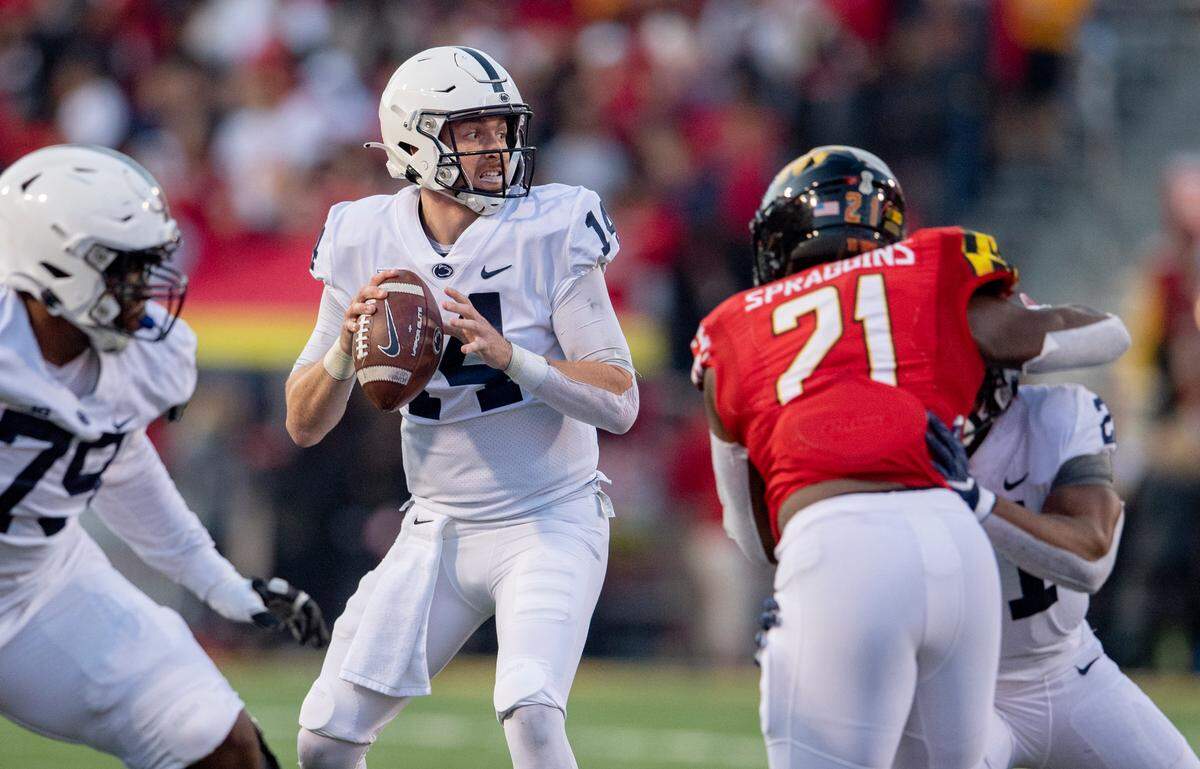 Penn State quarterback Sean Clifford drops back to make a pass to Jahan Dotson for a touchdown during the third quarter of the game on Saturday, Nov. 6, 2021.