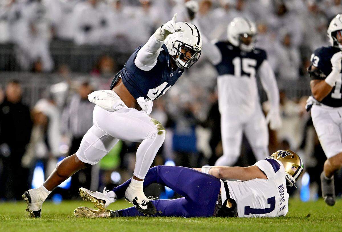 Penn State linebacker Kobe King celebrates his sack of Washington quarterback Will Rogers during the game on Saturday, Nov. 9, 2024.