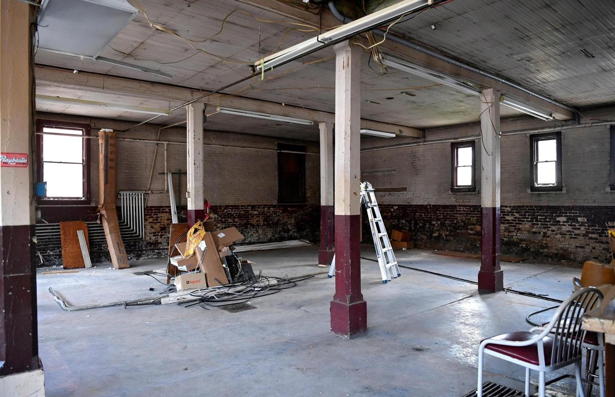 The area of the old Logan firehouse where the trucks were stored will be restored and converted into market space.