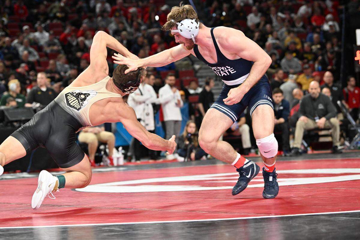 Penn State’s Creighton Edsell passes by Purdue’s Hayden Lohrey in their 165-pound Big Ten first round match on Saturday, March 5, 2022 in Lincoln, Neb. Edsell topped Lohrey, 3-1, in sudden victory.