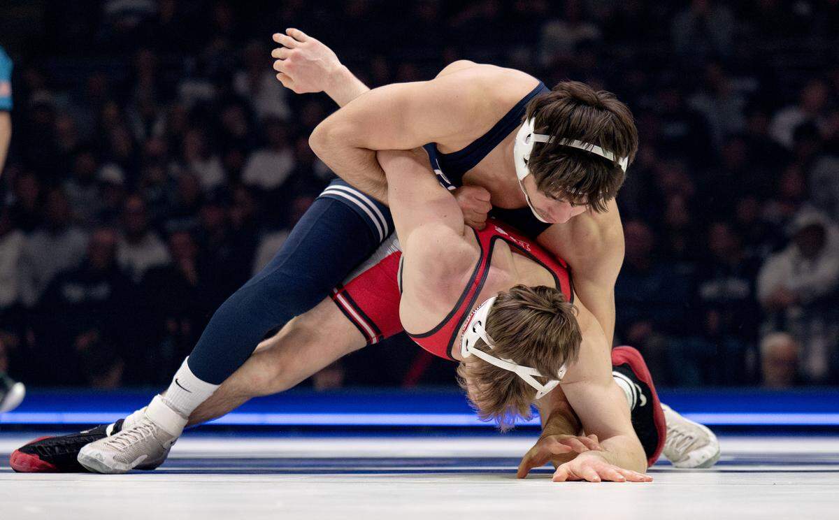 Penn State's PJ Duke controls Ohio State’s Daxton Chase in the 157 lb bout on Friday, Feb. 13, 2026 at the Bryce Jordan Center.