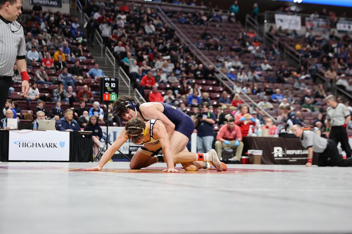 Bald Eagle Area’s Caleb Close controls Bishop McDevitt’s Lucas Lawler in their 172-pound seventh-place match of the PIAA Class 2A Championships on Saturday, March 11, 2023 at the Giant Center in Hershey. Close edged Lawler, 1-0.