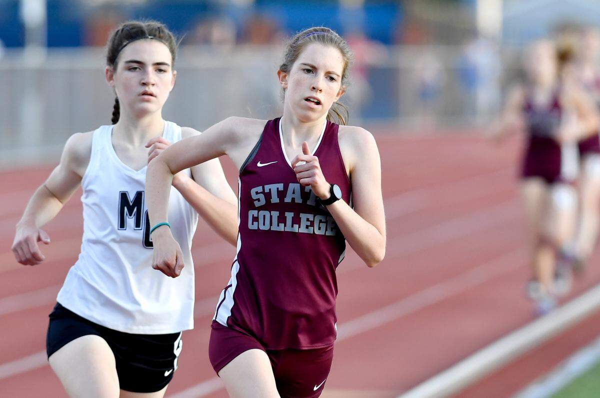 State CollegeÕs Jordan Reed runs the 3200 meter run at the District 6 3A track and field championships at Mansion Park on Thursday, May 20, 2021.