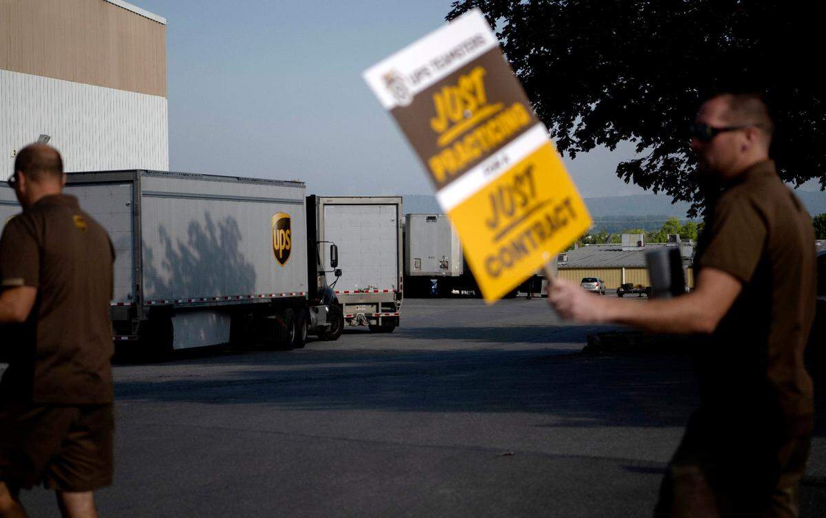 Local UPS workers from the 764 Teamsters union practiced picketing outside the State College UPS Customer Center on Thursday, July 13, 2023.