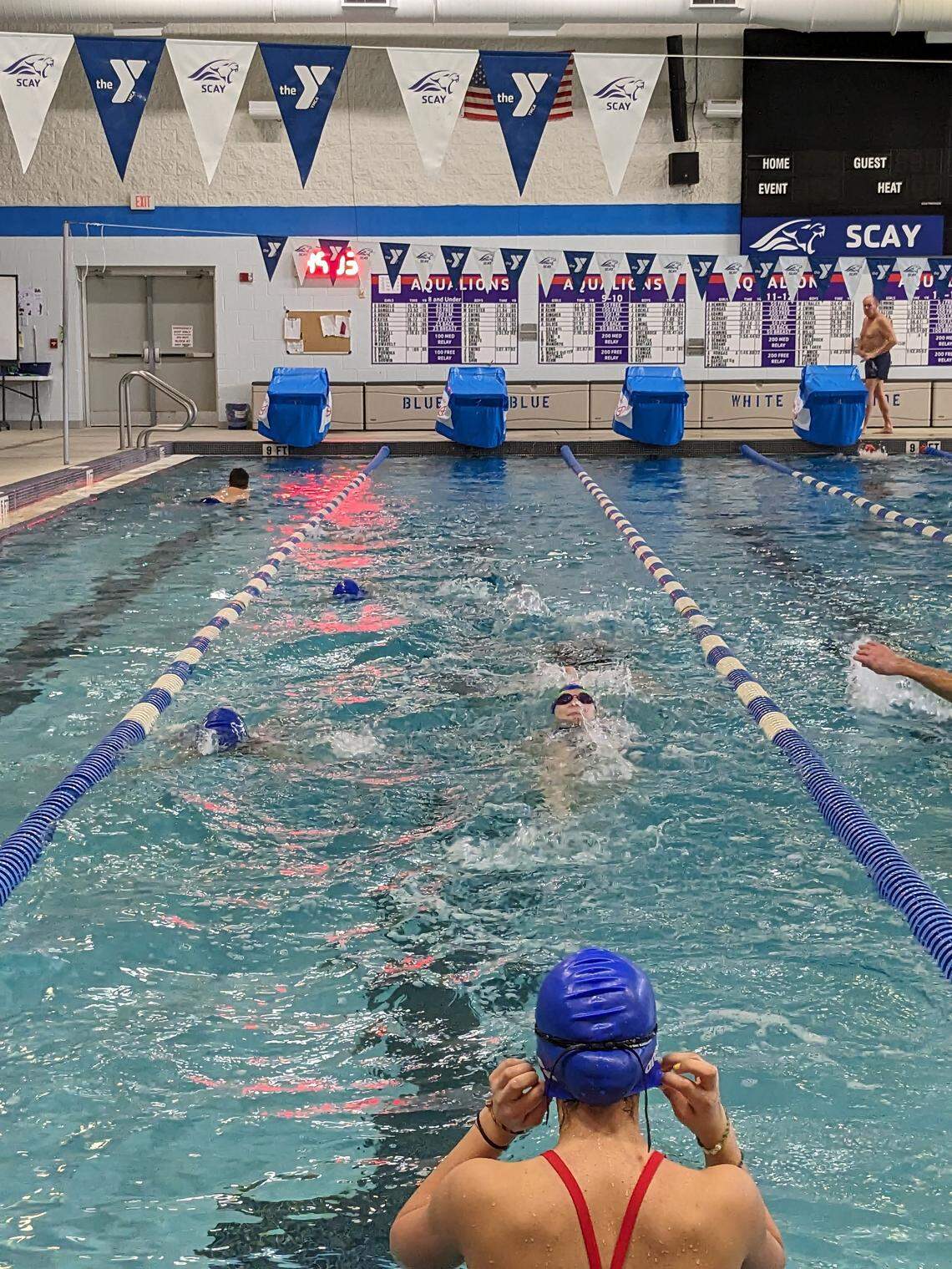 Swimmers from the State College Area YMCA swim team practice in the pool in this file photo.