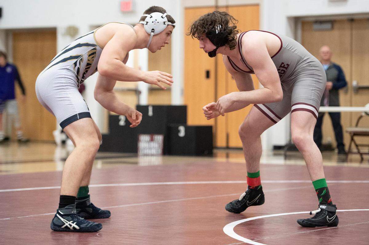 State College’s Braden Newby (right), pictured here in a Feb. 26 photo, was one of three county wrestlers to secure a technical fall in the District 6 Class 3A Championships.