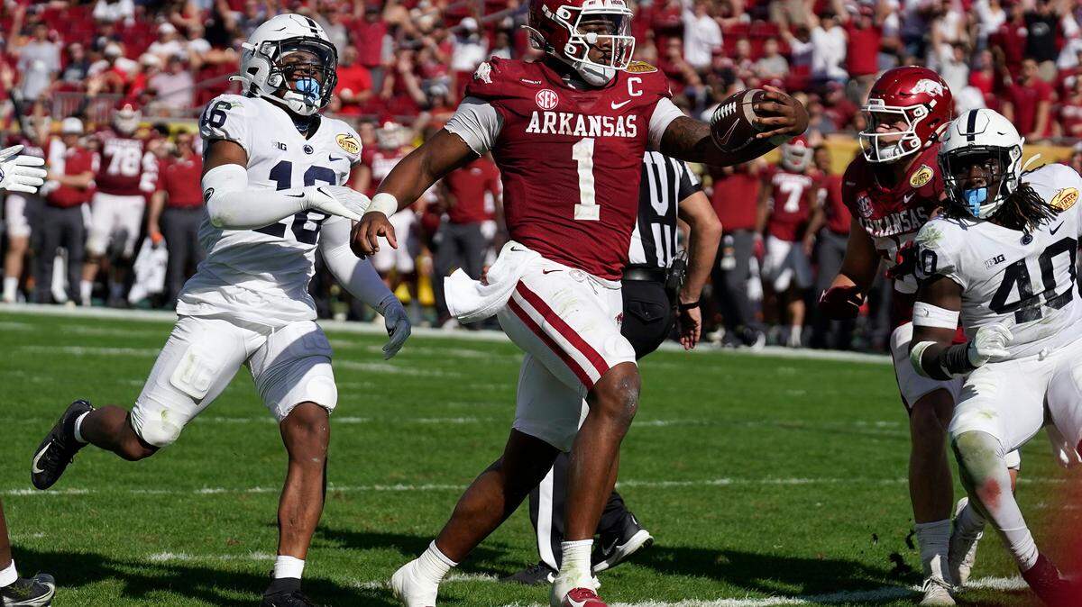 Arkansas quarterback KJ Jefferson (1) scores on an 8-yard touchdown run against Penn State during the second half of the Outback Bowl NCAA college football game Saturday, Jan. 1, 2022, in Tampa, Fla.