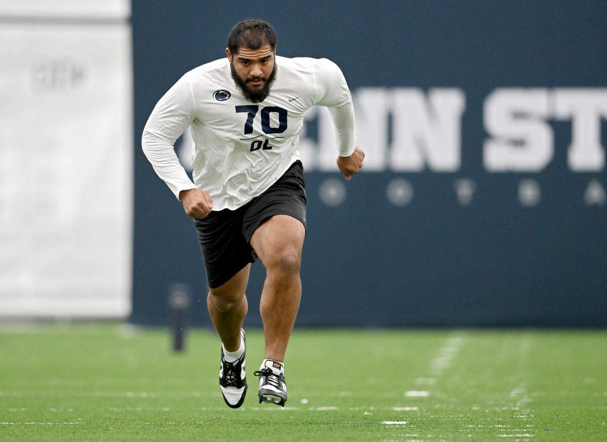 Offensive lineman Juice Scruggs runs the pro shuffle during Penn State football’s Pro Day on Friday, March 24, 2023.