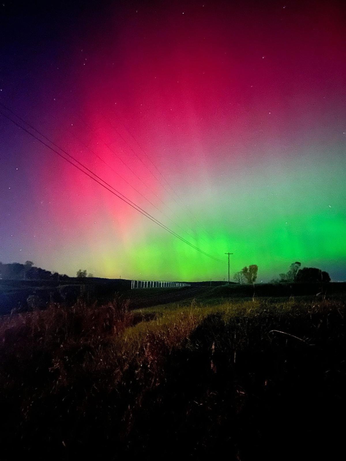 Jacob Galchenko shares his view of the northern lights Thursday from the area around the State College Regional Airport.