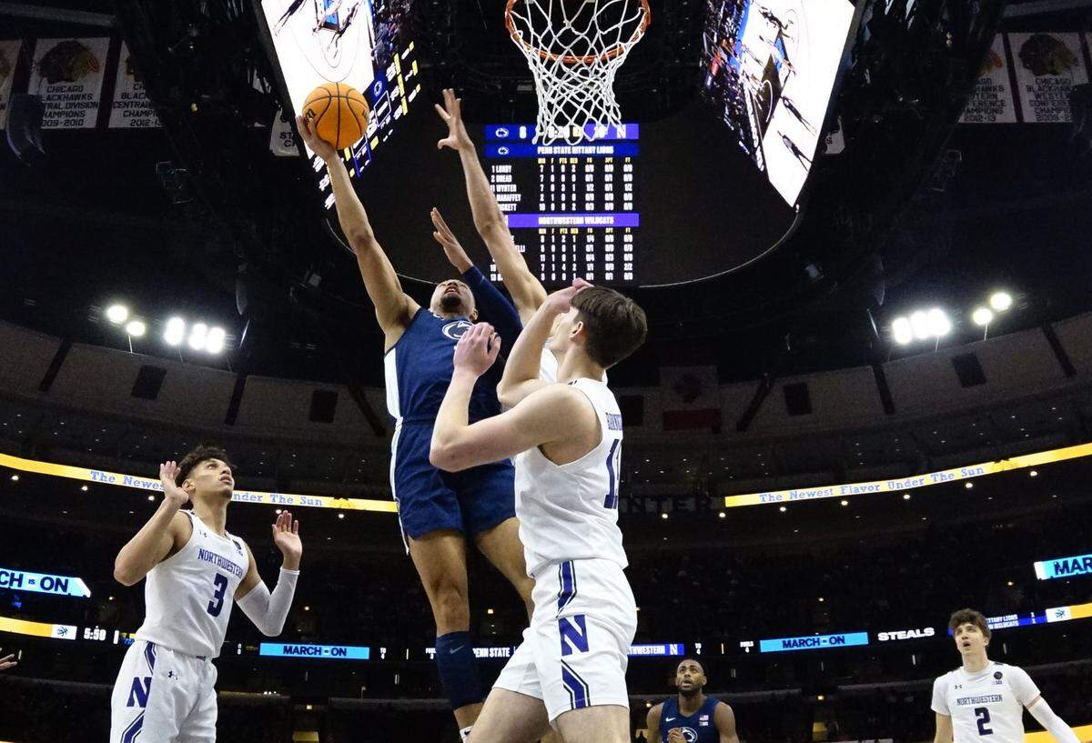 Mar 10, 2023; Chicago, IL, USA; Northwestern Wildcats guard Brooks Barnhizer (13) defends Penn State Nittany Lions guard Seth Lundy (1) during the second half at United Center. Mandatory Credit: David Banks-USA TODAY Sports