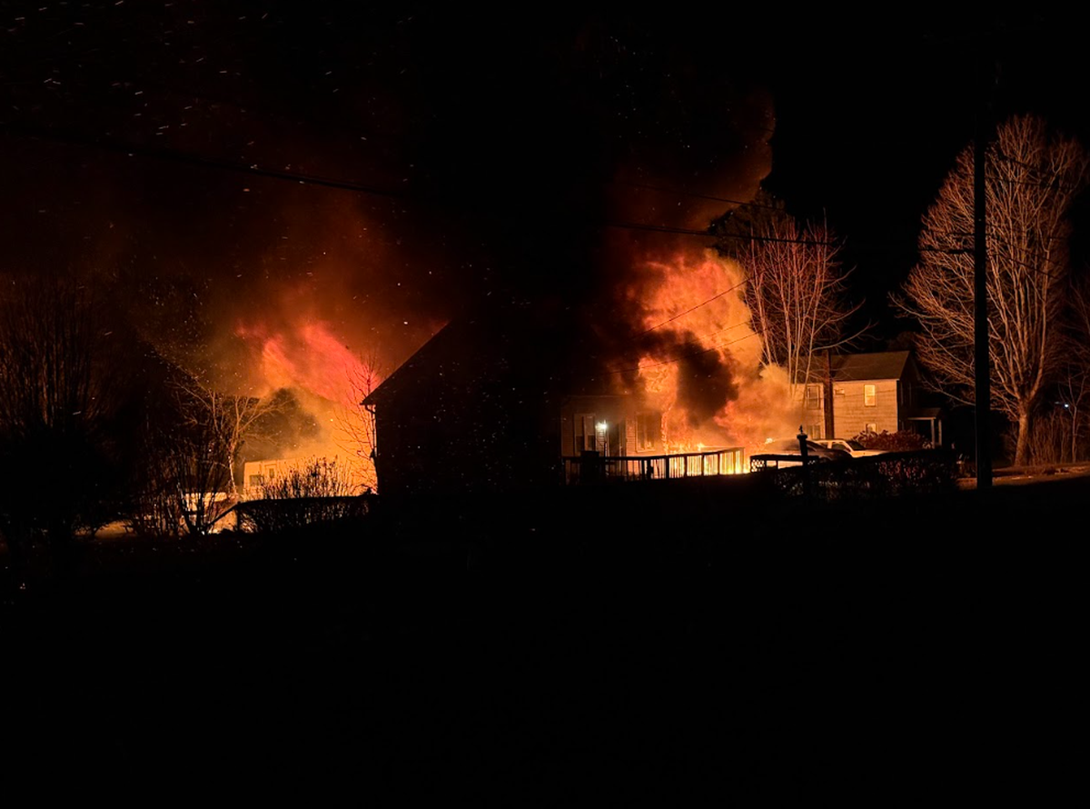 An early morning fire ravages a home at the 400 block of State Street in Rush Township.