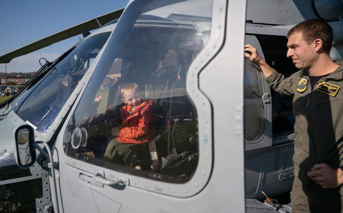 Bald Eagle Area elementary students check out the inside of the helicopters that was flown to the Veterans Day celebration on Thursday, Nov. 9, 2023.