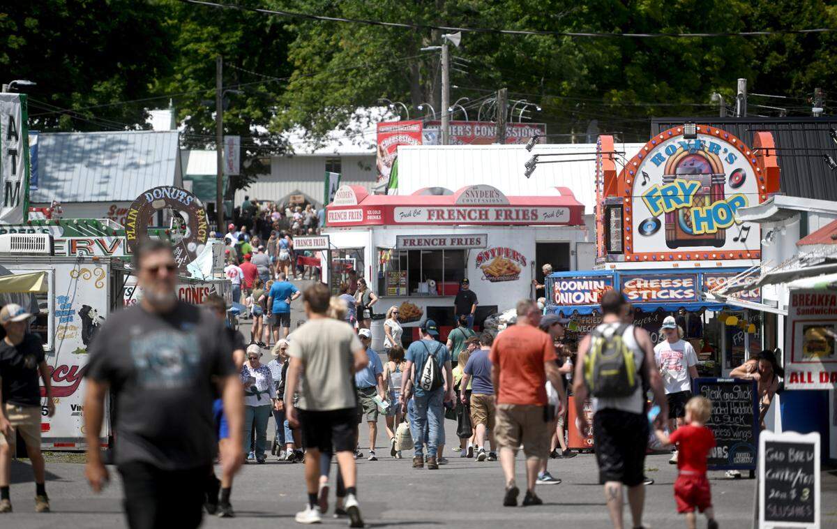 A look up Sharer Avenue at the Centre County Grange Encampment and Fair on Friday, Aug. 18, 2023.