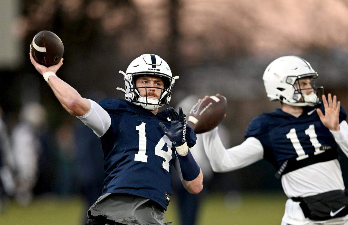 Penn State quarterback Sean Clifford makes a pass during practice on Wednesday, Nov. 9, 2022.