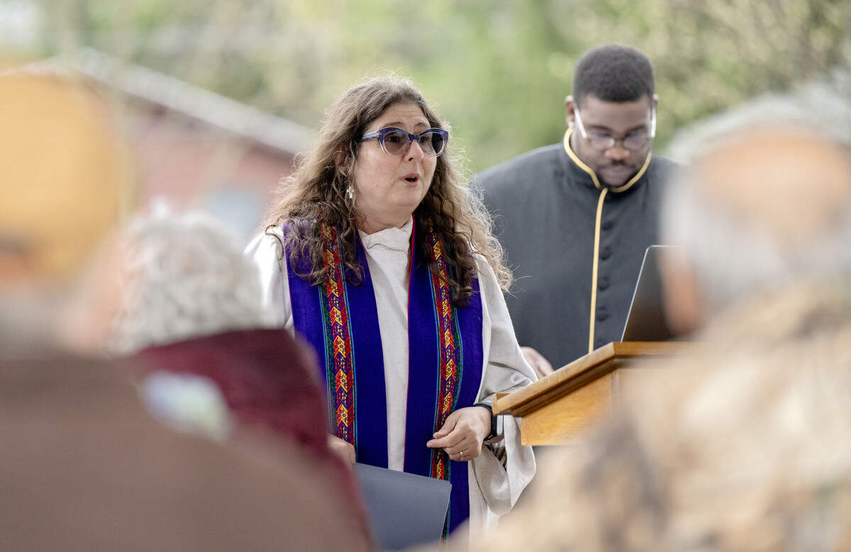 Rev. Renee Ford speaks during the steeple blessing ceremony outside of Woodycrest United Methodist Church on Thursday, April 2, 2026.