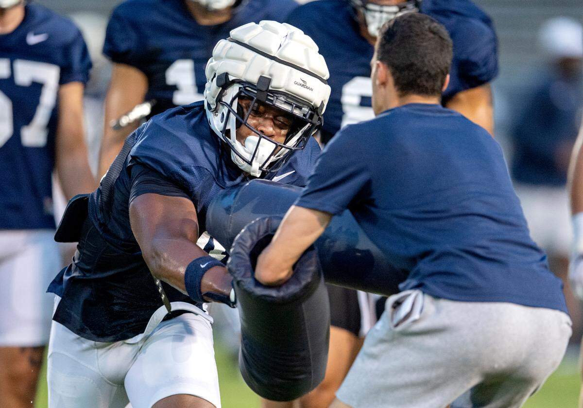 Penn State linebacker Kobe King runs a drill during practice on Wednesday, Aug. 25, 2021 in Beaver Stadium.