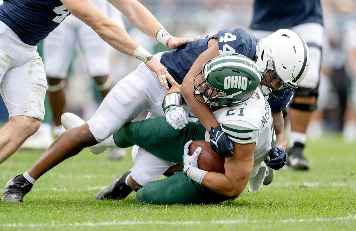 Penn State defensive end Chop Robinson tackles Ohio’s Nolan McCormick during the game on Saturday, Sept. 10, 2022.