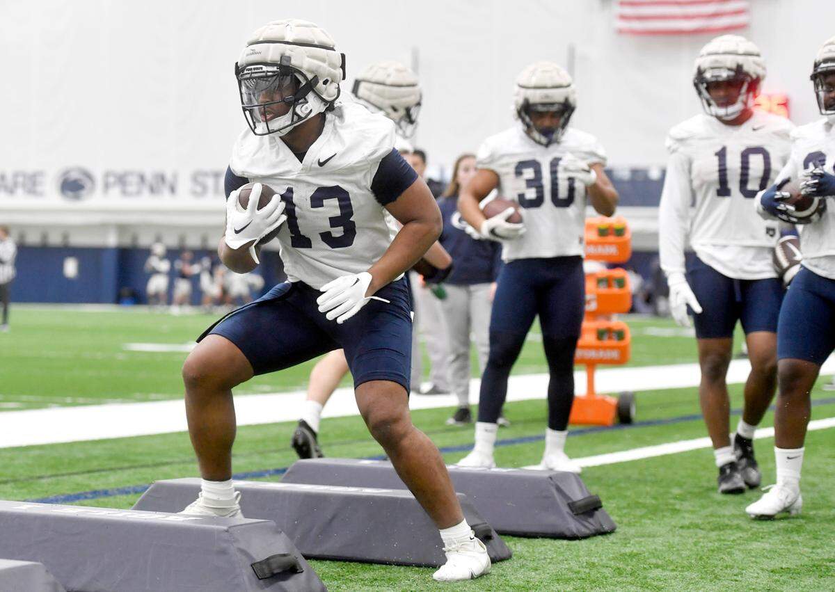 Penn State running back Kaytron Allen runs a drill during spring practice on Tuesday, March 14, 2023.