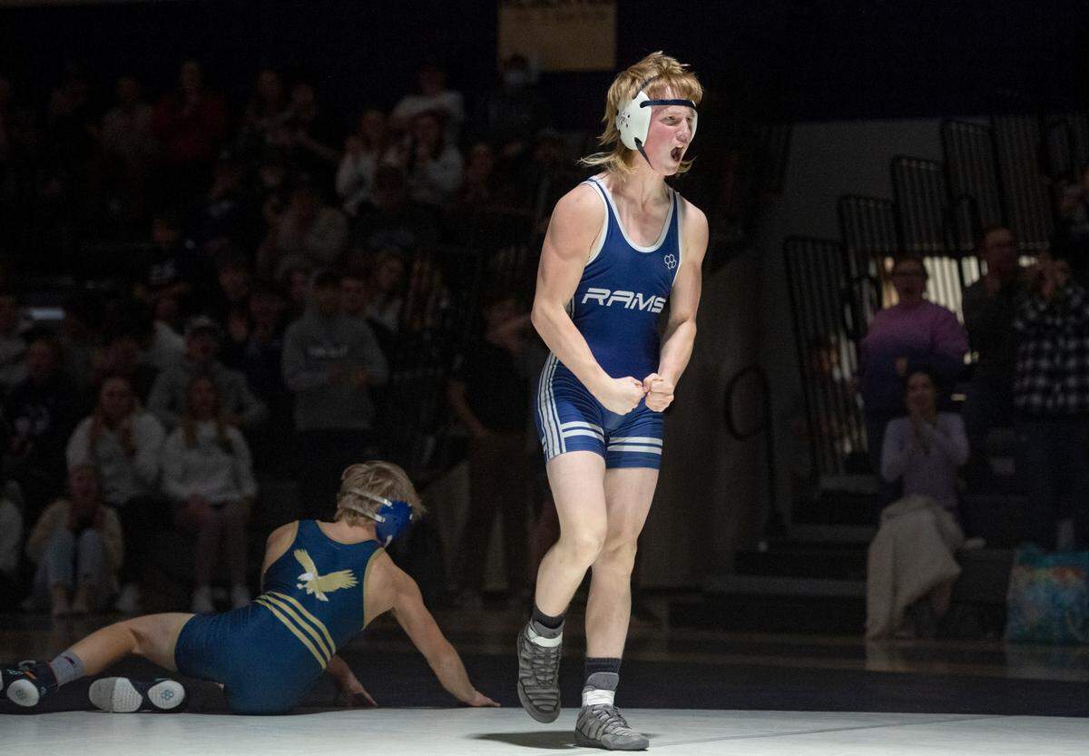 Penns Valley’s Carter Homan celebrates his pin of Bald Eagle Area’s Hunter Gardner lb bout of the match on Wednesday, Jan. 12, 2022.
