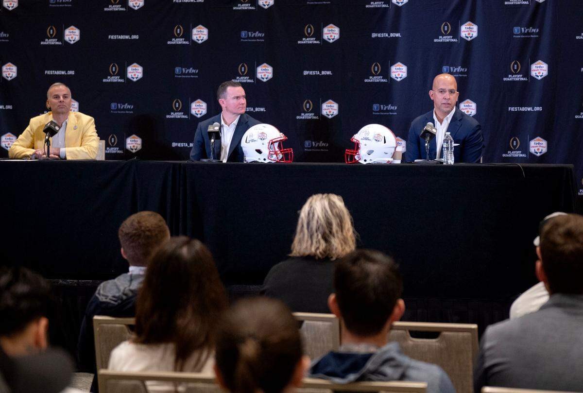 Boise State coach Spencer Danielson and Penn State football coach James Franklin answer questions during a Fiesta Bowl press conference on Monday, Dec. 30, 2024 at the Camelback Inn.