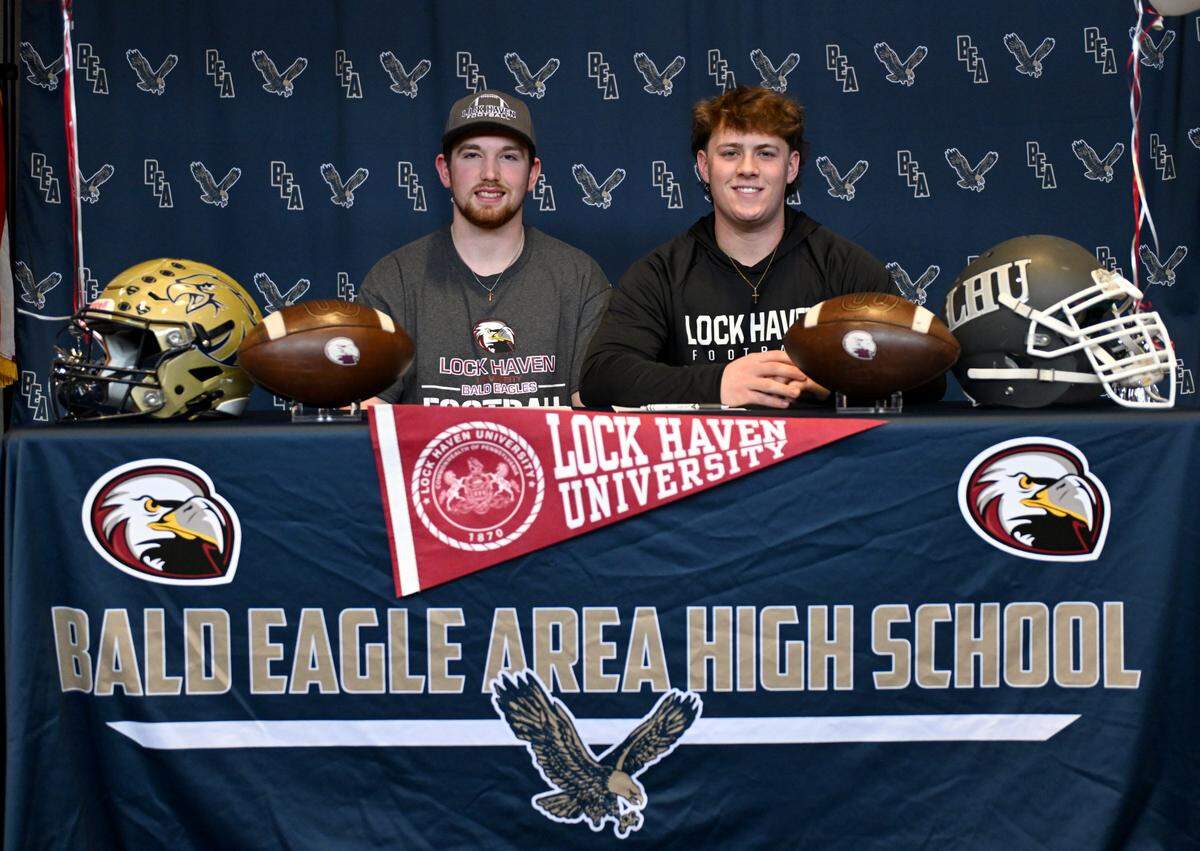 Bald Eagle Area’s Wyatt Spackman and Carson Nagle sign to play at football at Lock Haven on Wednesday, Feb. 5, 2025.