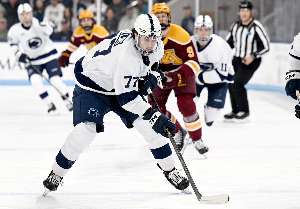 Penn State's Nolan Collins skates ahead of Minnesota defenders during the game on Wednesday, March 11, 2026 at Pegula Ice Arena. 