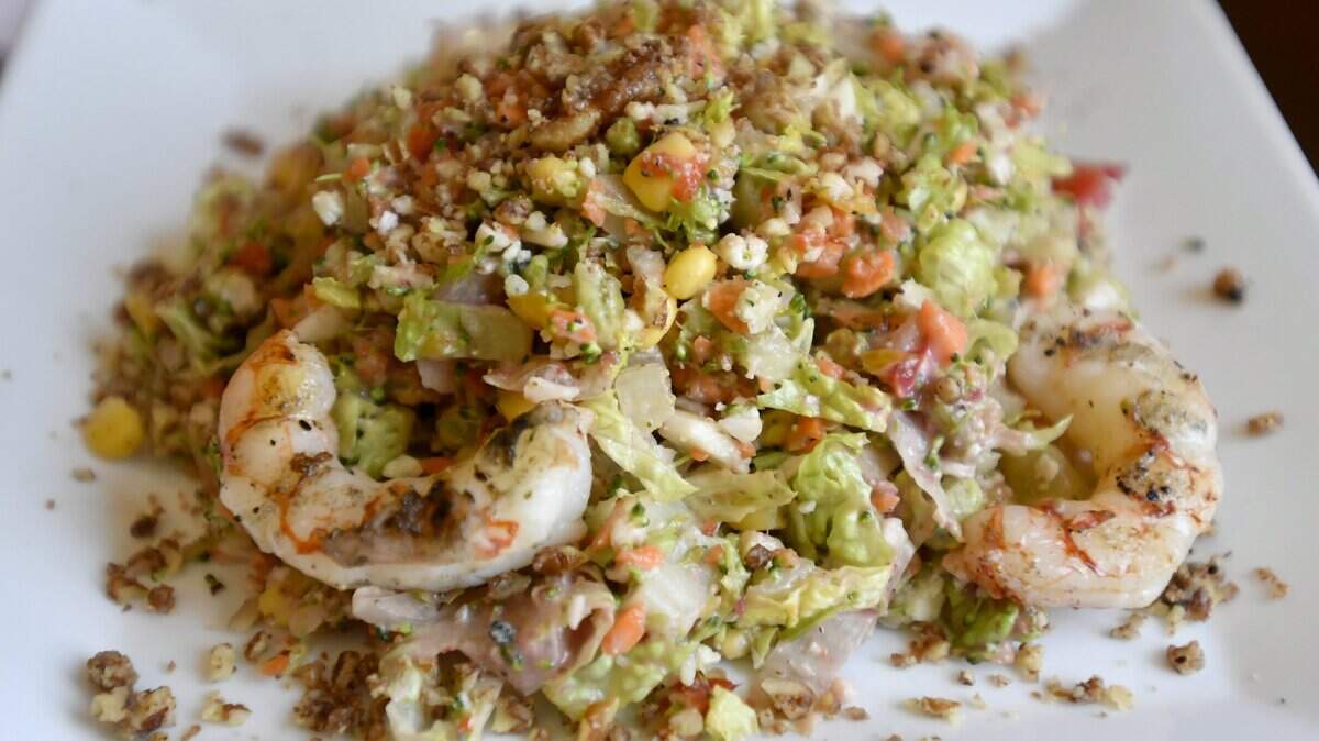 A chop salad with shrimp is among lunch menu items at Spats at the Grill.
