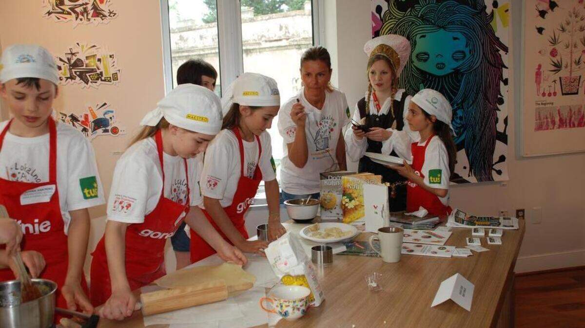 Ivan Dominik Moro, Sara Kohl, Nina Anastazija Samardžija and Brina Samardžija participate in a demonstration of the Cooking Kids program at the Slovenian Embassy in Washington, D.C., on May 9.
