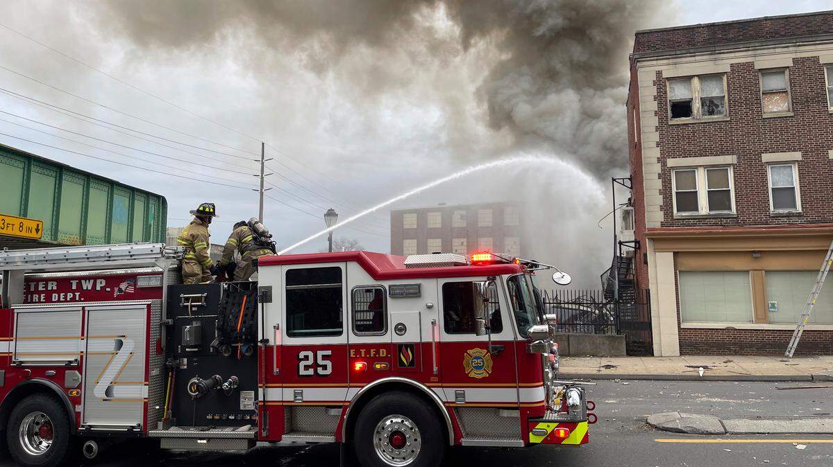 Emergency personnel work at the site of a deadly explosion at a chocolate factory in West Reading, Pa., Friday, March 24, 2023. ( Ben Hasty /Reading Eagle via AP)