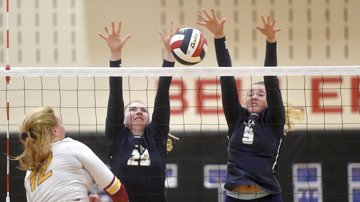 Bald Eagle Area’s Elita Brown and Katelyn Smitchko jump to block the hit from Serra Catholic in the first round of the PIAA 2A girls volleyball tournament on Tuesday, Nov. 6, 2018. Bald Eagle Area won and moves on to the quarterfinals.
