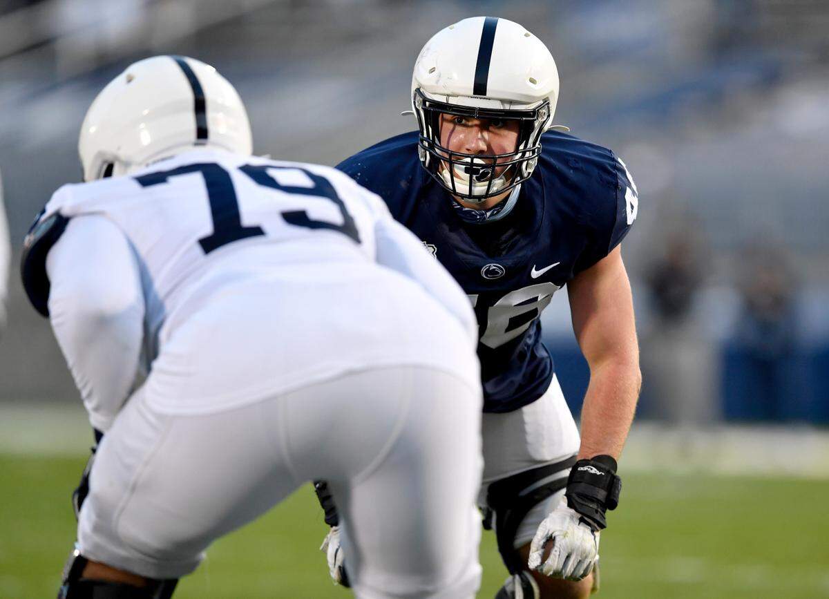 Defensive end Nick Tarburton lines up for a play during Penn State football practice on Friday, April 23, 2021 at Beaver Stadium.