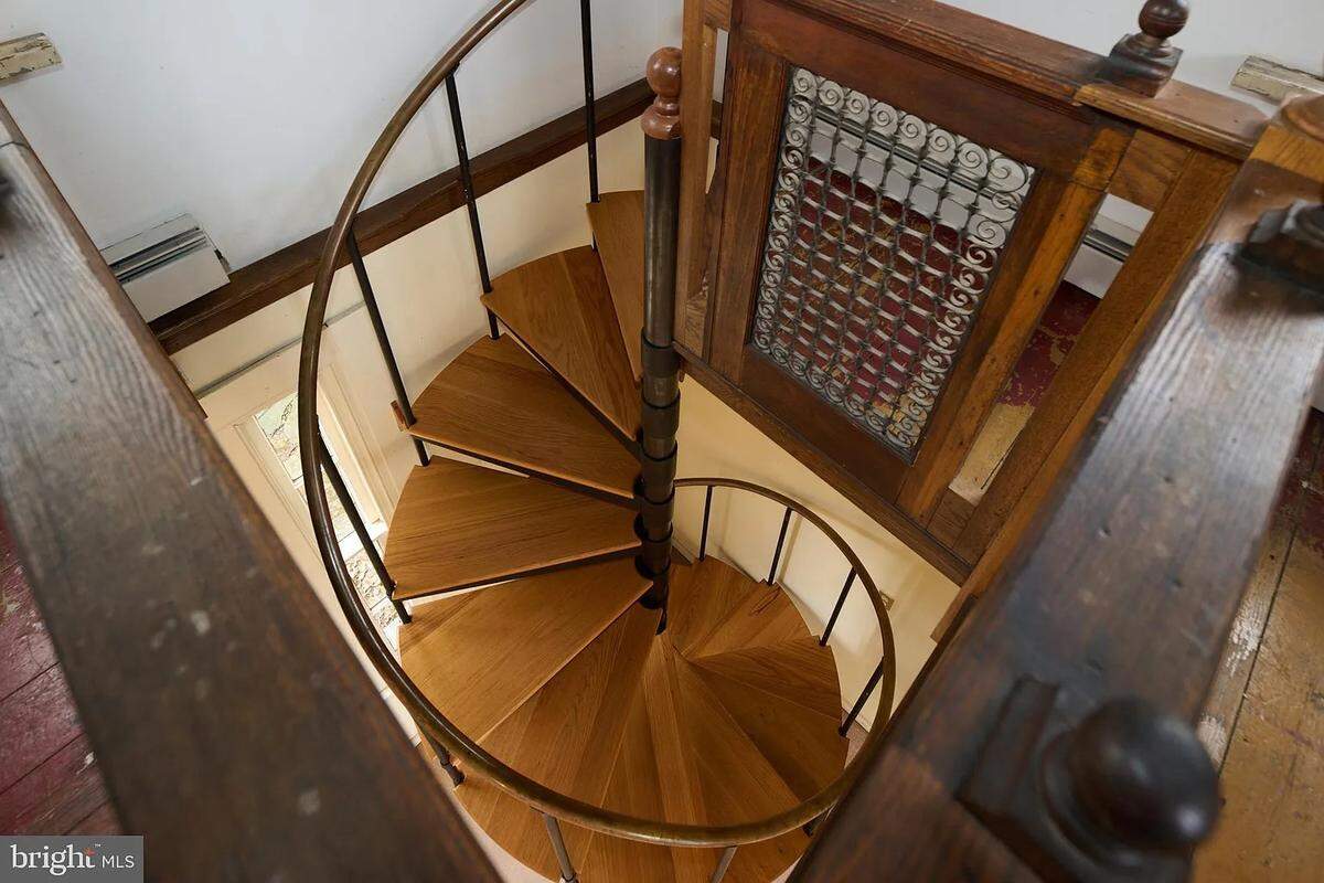 A look down the home’s spiral staircase. Photo shared with permission from the home’s listing agent, Vicki Wedler of Kissinger, Bigatel and Brower Realtors.