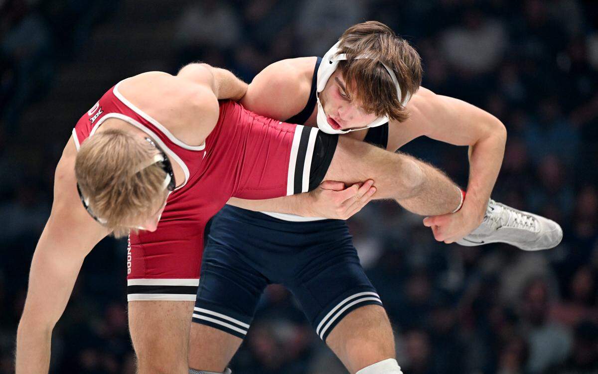 Penn State’s Marcus Blaze controls Oklahoma’s Tyson Charmoli in the 133 lb bout during the match on Friday, Nov. 14, 2025 at the Bryce Jordan Center.
