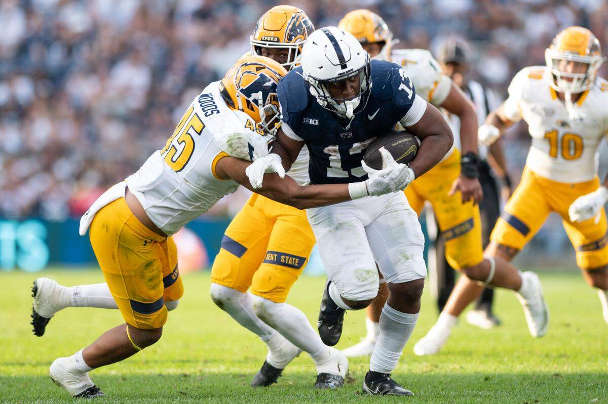 Running back Kaytron Allen breaks a tackle during the football game against Kent State at Beaver Stadium on Saturday, Sept. 21, 2024. Penn State won 56-0.
